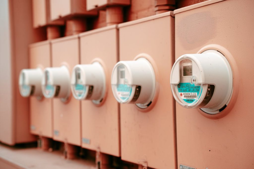 pexels-photo-11924298 Close-up view of a row of industrial electricity meters for power monitoring and technology.